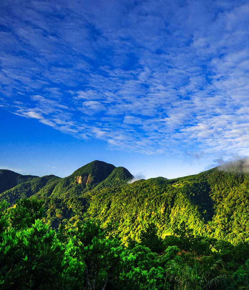 Greenish mountain with beautiful sky